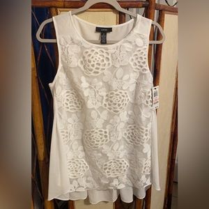 White top-crochet floral detailing.